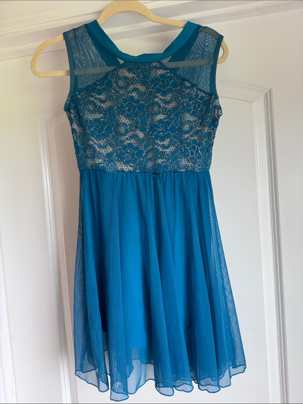 Teal lace overlay with gold and rhinestones underneath ballet or lyrical costume